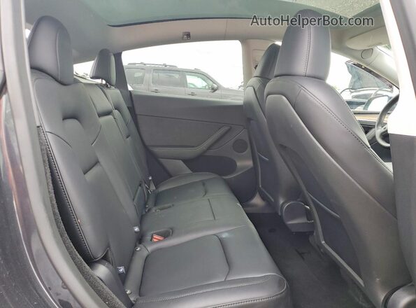 7SAYGDED2SF259629 2025 TESLA MODEL Charcoal Հետևի նստատեղերի տեսք