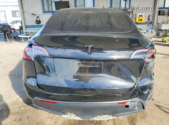 7SAYGDED2SF274082 2025 TESLA MODEL Black Widok z tyłu