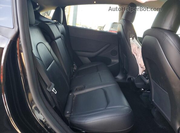 7SAYGDED2SF274082 2025 TESLA MODEL Black Widok tylnych siedzeń