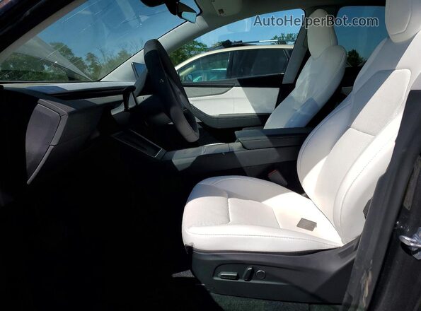 7SAYGDED2TA490545 2026 TESLA MODEL Charcoal Widok wnętrza z przodu