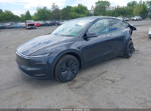 7SAYGDED2TF396037 2026 TESLA MODEL Y Gray Vista tres cuartos delantera izquierda