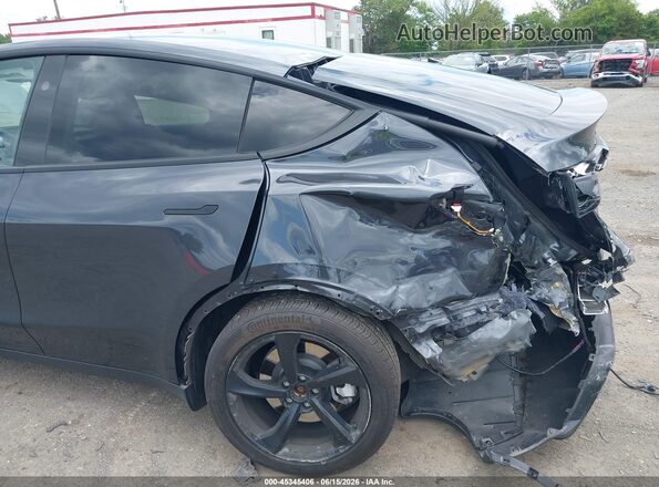 7SAYGDED2TF396037 2026 TESLA MODEL Y Gray Vista frontal