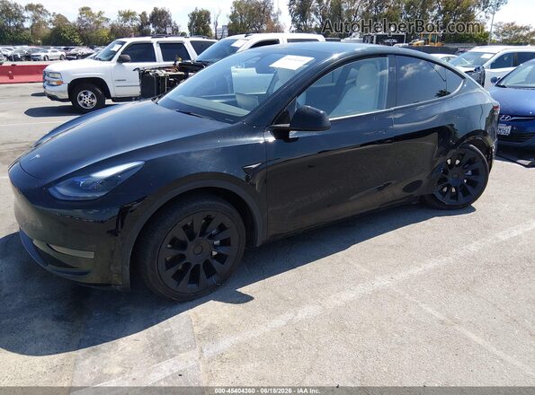 7SAYGDED3RF025168 2024 TESLA MODEL Y Black წინა მარცხენა ხედი სამი მეოთხედიდან