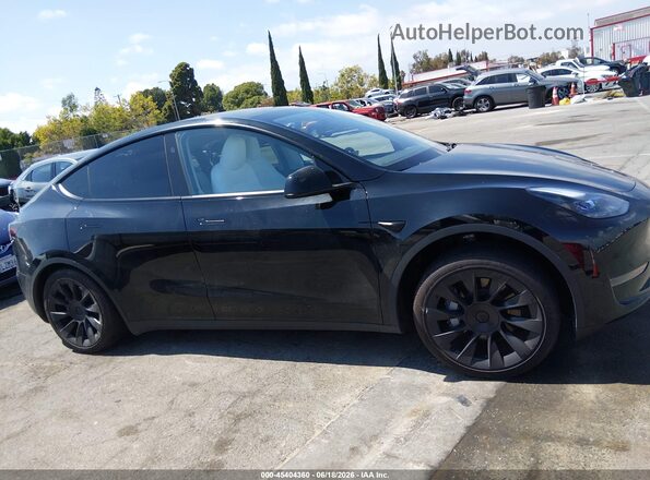 7SAYGDED3RF025168 2024 TESLA MODEL Y Black ხელსაწყოთა პანელის ხედი