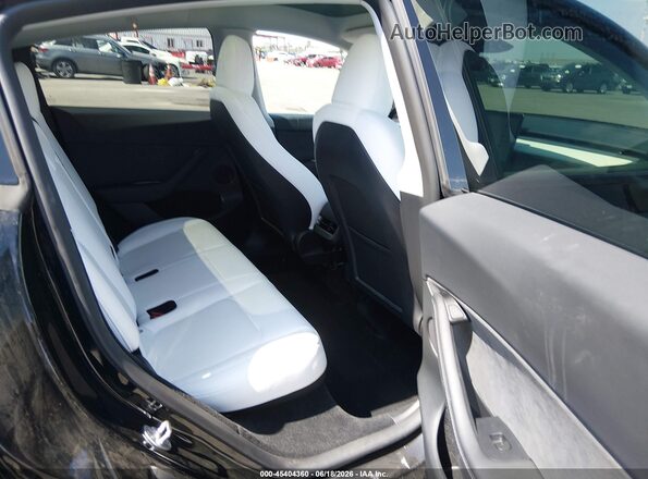 7SAYGDED3RF025168 2024 TESLA MODEL Y Black VIN კოდის სტიკერის ხედი
