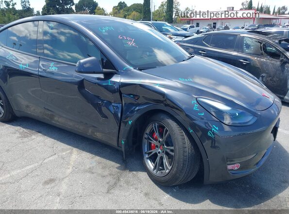 7SAYGDED3RF103416 2024 TESLA MODEL Y Black Front view