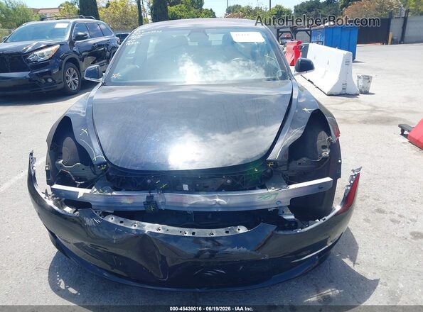 7SAYGDED3RF103416 2024 TESLA MODEL Y Black Rear interior view