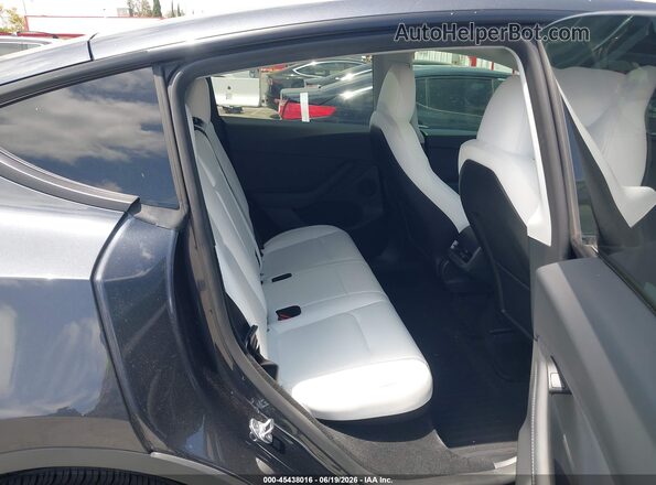 7SAYGDED3RF103416 2024 TESLA MODEL Y Black VIN sticker view