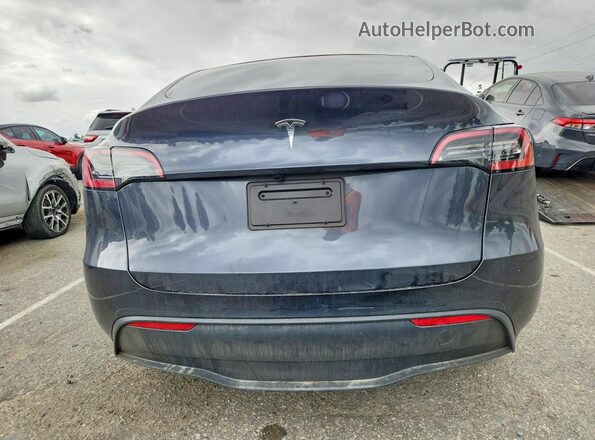 7SAYGDED3SF319160 2025 TESLA MODEL Gray Vista trasera