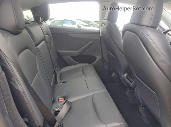 7SAYGDED3TF443799 2026 TESLA MODEL Charcoal უკანა სალონის ხედი