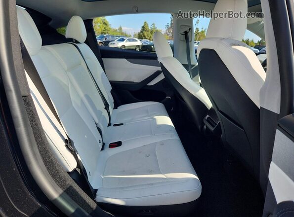 7SAYGDED3TF539321 2026 TESLA MODEL Black Widok wnętrza z tyłu