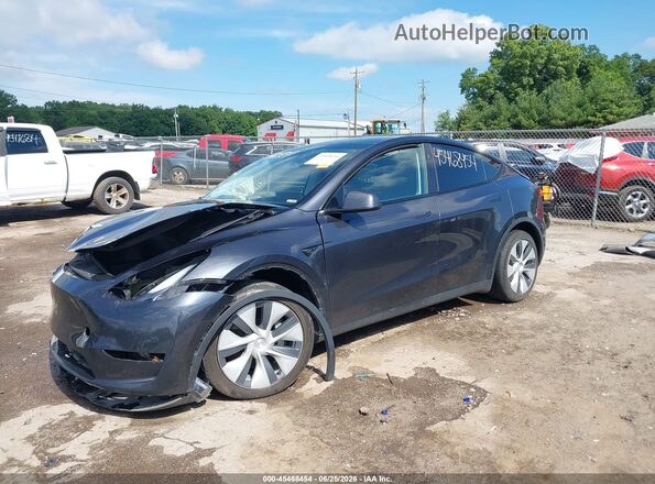 7SAYGDED4RF055747 2024 TESLA MODEL Y Gray Առջևի ձախ երեք քառորդ տեսարան