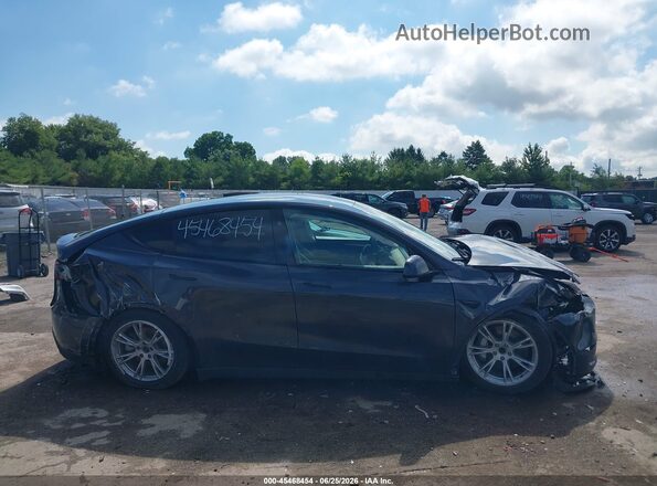 7SAYGDED4RF055747 2024 TESLA MODEL Y Gray Սարքավորումների վահանակի տեսք