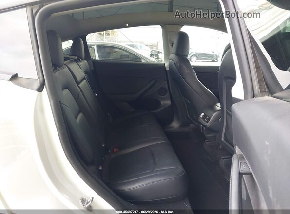 7SAYGDED4RF214265 2024 TESLA MODEL Y White VIN კოდის სტიკერის ხედი