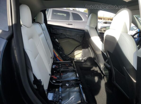 7SAYGDED4SA377758 2025 TESLA MODEL Charcoal Widok wnętrza z tyłu