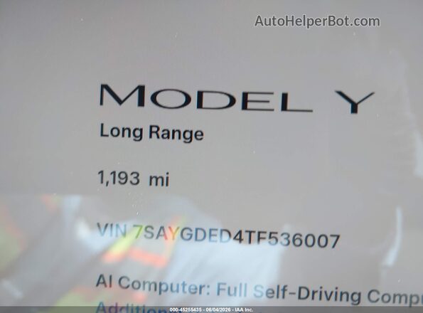 7SAYGDED4TF536007 2026 TESLA MODEL Y Gray Vista de los asientos traseros