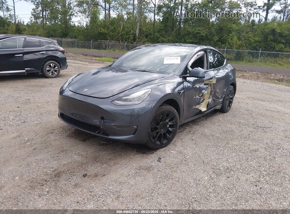 7SAYGDED5PF945977 2023 TESLA MODEL Y Gray Առջևի ձախ երեք քառորդ տեսարան