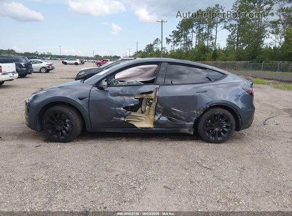 7SAYGDED5PF945977 2023 TESLA MODEL Y Gray Սալոնի 360 աստիճան տեսք
