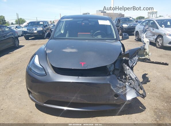 7SAYGDED5RF186542 2024 TESLA MODEL Y Black Առջևի վահանակի տեսք