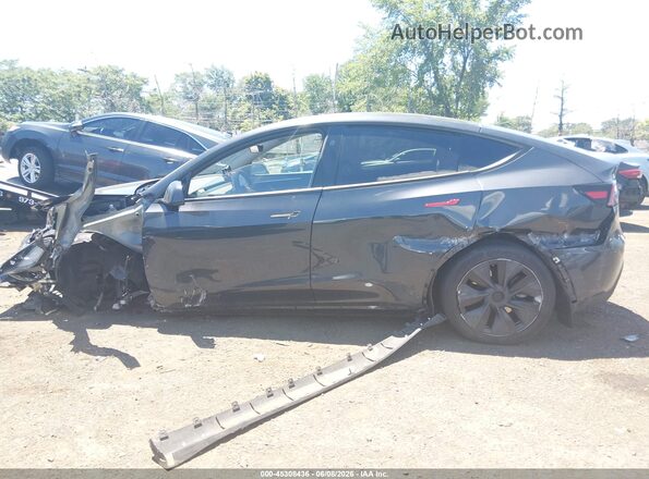 7SAYGDED5RF186542 2024 TESLA MODEL Y Black Սալոնի հետևի տեսք