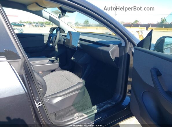 7SAYGDED5TA607440 2026 TESLA MODEL Y Серый Вид салона спереди