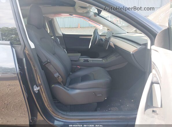 7SAYGDED6SF269807 2025 TESLA MODEL Y Серый Вид салона спереди