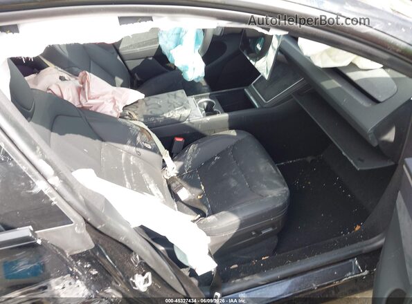 7SAYGDED6TA653875 2026 TESLA MODEL Y Черный Вид салона спереди