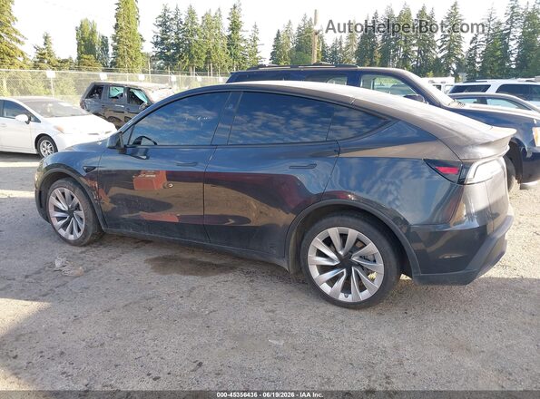7SAYGDED6TF401370 2026 TESLA MODEL Y Gray Rear interior view