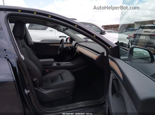 7SAYGDED7RA296540 2024 TESLA MODEL Y Gray Vista interior delantera