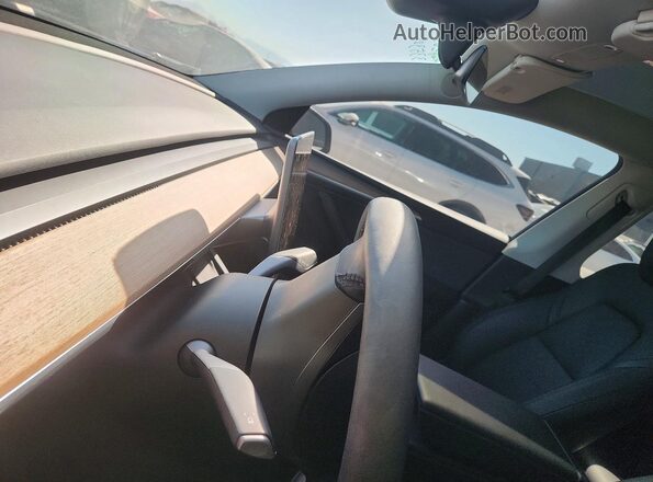 7SAYGDED7RA335305 2024 TESLA MODEL Gray Սարքավորումների վահանակի տեսք