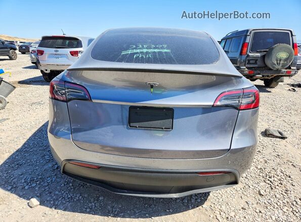 7SAYGDED7RA335305 2024 TESLA MODEL Gray Հետևի տեսք