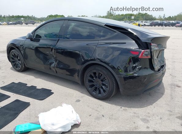 7SAYGDED7RF035203 2024 TESLA MODEL Y Black Trasero izquierdo