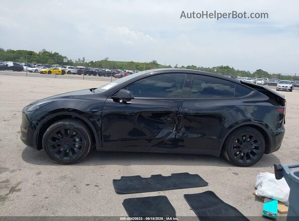 7SAYGDED7RF035203 2024 TESLA MODEL Y Black Vista del cuadro de instrumentos