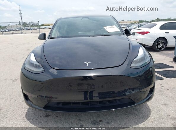 7SAYGDED7RF035203 2024 TESLA MODEL Y Black Vista trasera