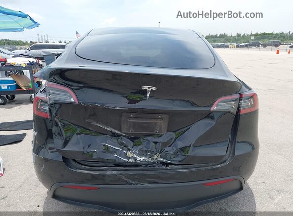7SAYGDED7RF035203 2024 TESLA MODEL Y Black Vista interior de 360 grados
