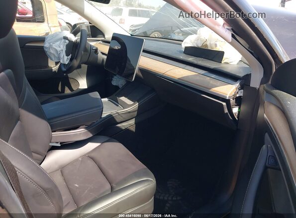 7SAYGDED7RF180287 2024 TESLA MODEL Y Black Front interior view