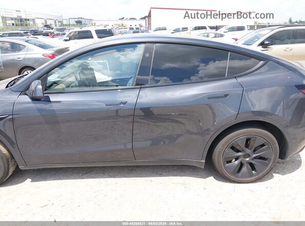 7SAYGDED7SA347251 2025 TESLA MODEL Y Black Vista interior trasera