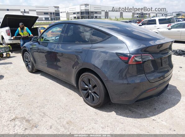 7SAYGDED7SA347251 2025 TESLA MODEL Y Black Trasero izquierdo