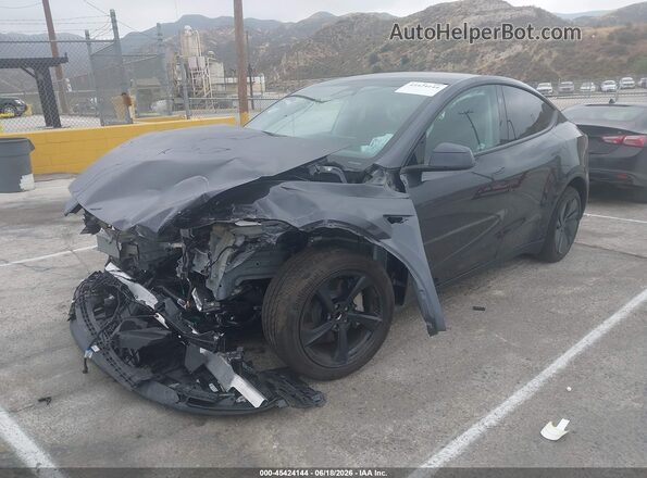 7SAYGDED7TF542867 2026 TESLA MODEL Y Black წინა მარცხენა ხედი სამი მეოთხედიდან