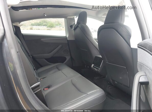 7SAYGDED7TF542867 2026 TESLA MODEL Y Black VIN კოდის სტიკერის ხედი