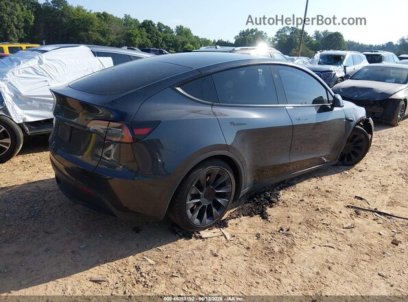 7SAYGDED8RF091246 2024 TESLA MODEL Y Gray უკანა მარჯვენა