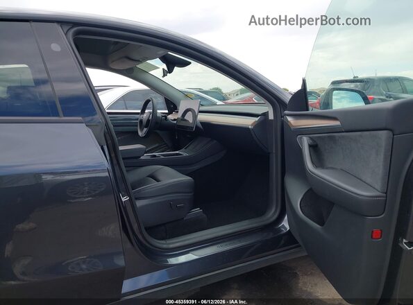 7SAYGDED8SF269260 2025 TESLA MODEL Y Gray Вид салону спереду
