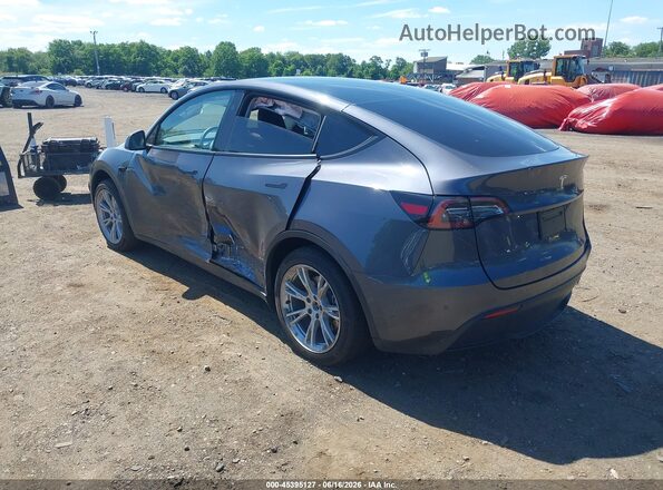7SAYGDED9PF922802 2023 TESLA MODEL Y Gray Trasero izquierdo