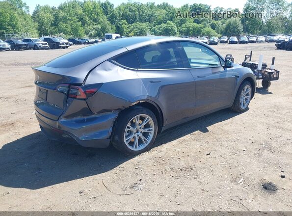 7SAYGDED9PF922802 2023 TESLA MODEL Y Gray Trasero derecho