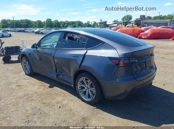 7SAYGDED9PF922802 2023 TESLA MODEL Y Gray Vista frontal