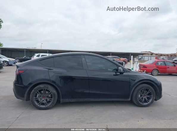 7SAYGDED9RA310874 2024 TESLA MODEL Y Black Вид задньої частини салону