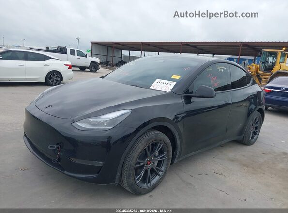 7SAYGDED9RA310874 2024 TESLA MODEL Y Black Передня ліва чверть