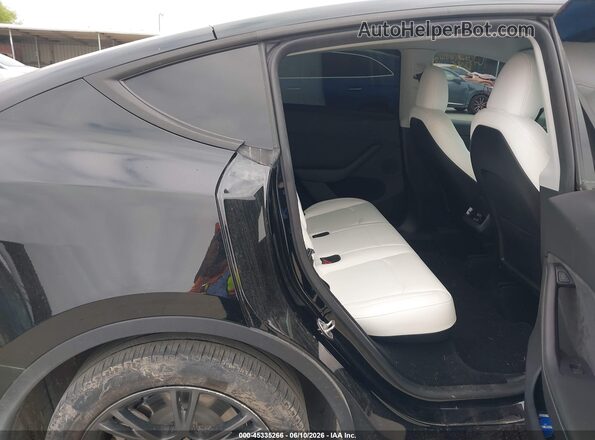 7SAYGDED9RA310874 2024 TESLA MODEL Y Black Вид наклейки з VIN-кодом