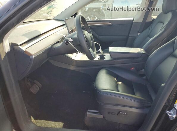 7SAYGDED9RF120883 2024 TESLA MODEL Черный Вид салона спереди