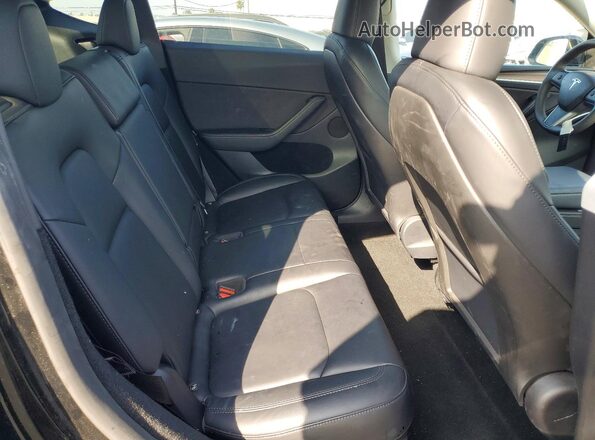 7SAYGDED9RF120883 2024 TESLA MODEL Черный Вид задней части салона